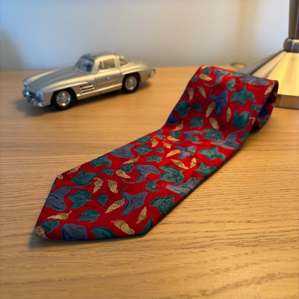 Dior Vibrant Red Tie with Blue and Gold Patterns